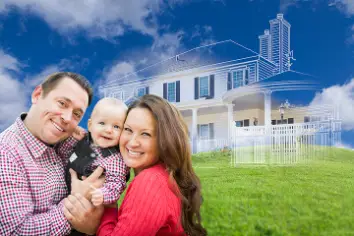 A father, mother and child with a house background