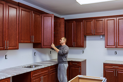 Carpenter installing custeom cabinets Rockalnd County NY